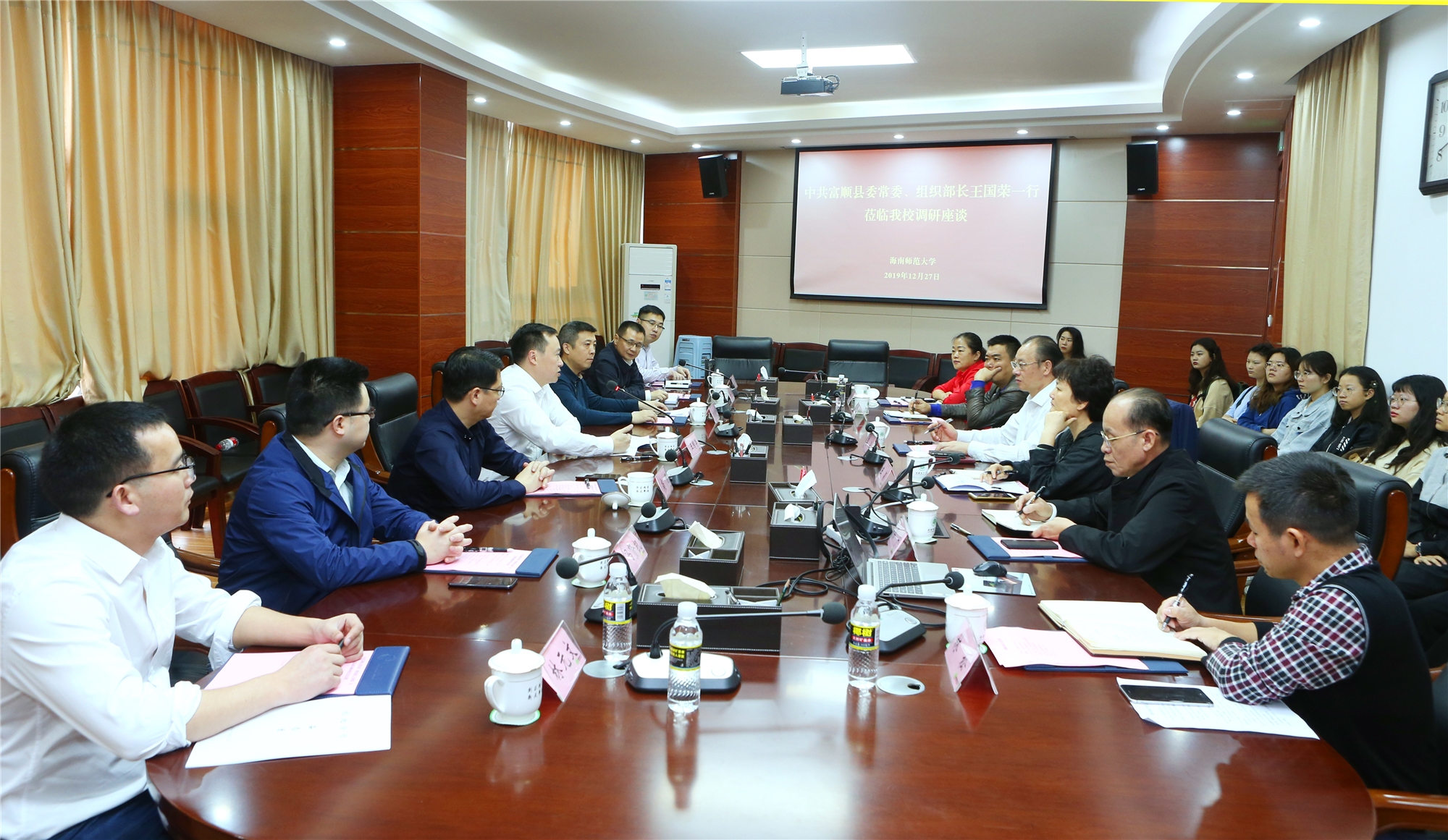 四川省富顺县委常委、组织部部长王国荣一行来我校调研座谈